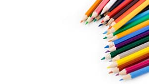 Coriden English Tuition pencils on a plain background